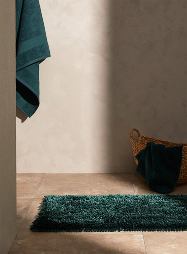 Silky chenille bath mat